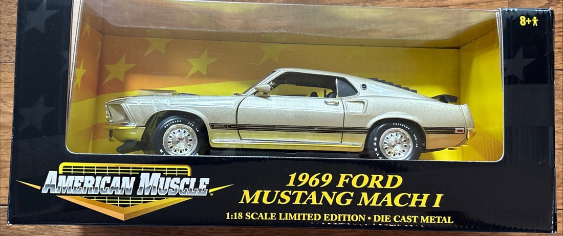 
  
  32511 ERTL AMERICAN MUSCLE CHAMPAGNE GOLD 1969 FORD MUSTANG MACH 1 1:18 DIE CAST
  
