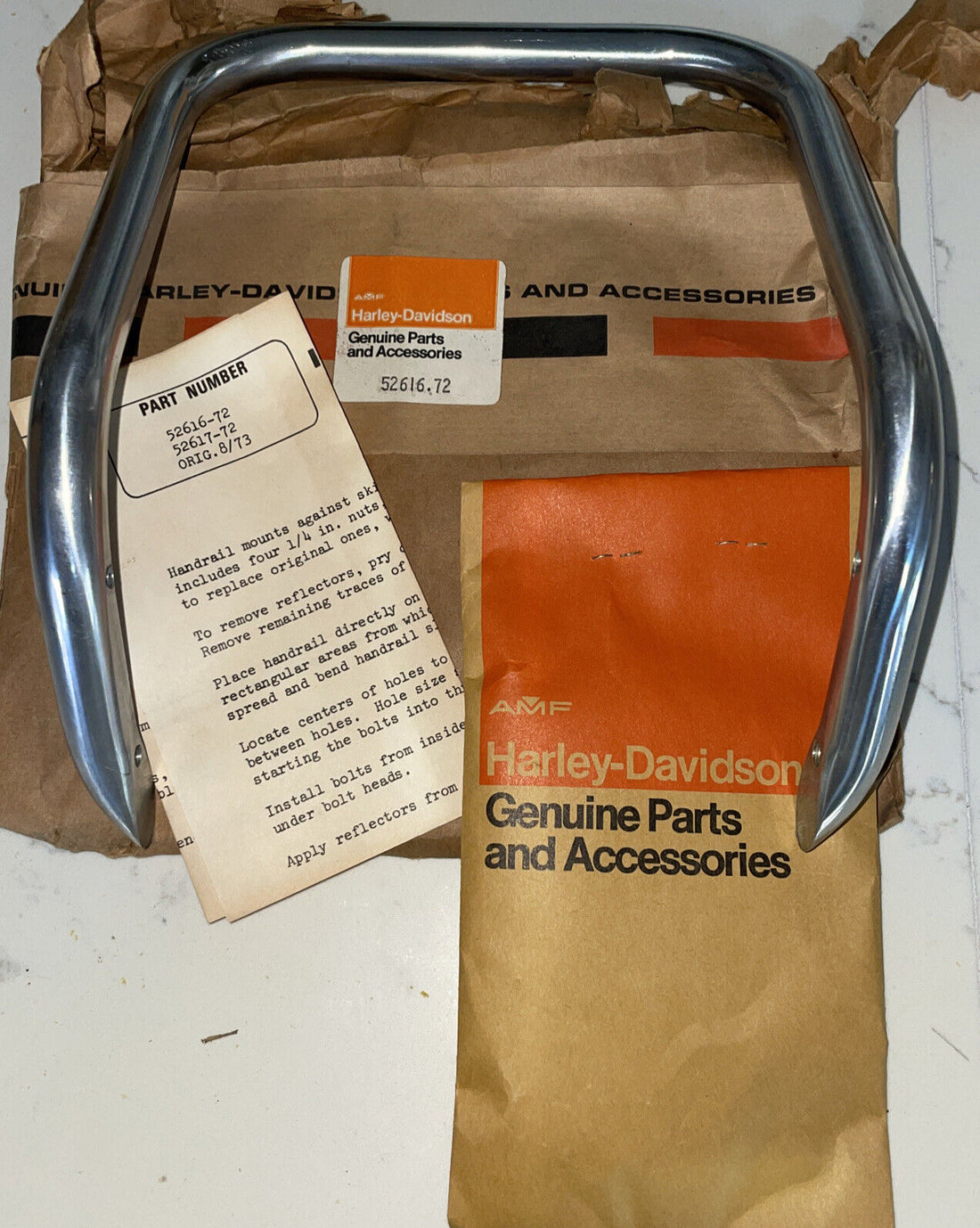 
  
  52616-72 HARLEY-DAVIDSON 1972-78 SPORTSTER XL HANDRAIL  OEM NOS
  
