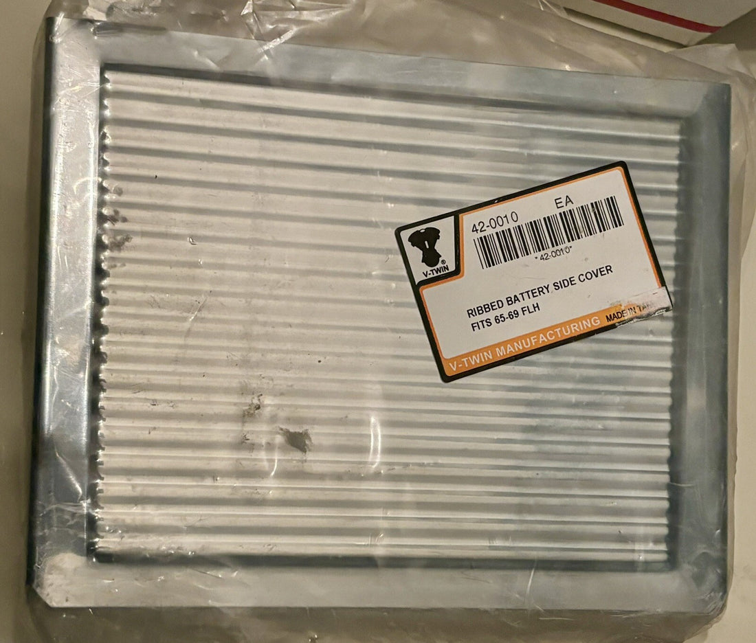 
  
  42-0010 V-TWIN CHROME RIBBED BATTERY SIDE COVER HARLEY 1965-1969 FLH NOS
  
