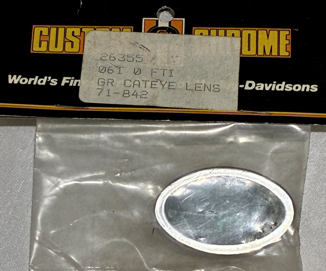 
  
  26355 CUSTOM CHROME GREEN CATEYE TAILLIGHT LENS FOR HARLEY-DAVIDSON NOS
  
