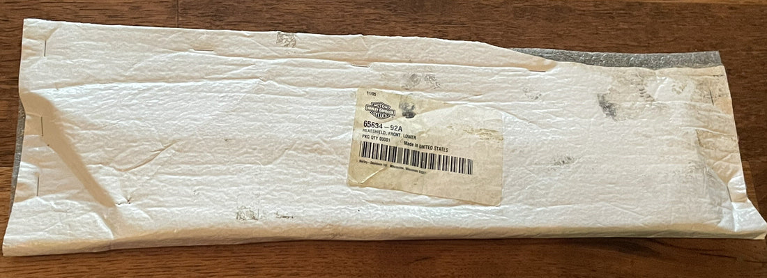 
  
  65634-92A HARLEY-DAVIDSON FRONT LOWER HEATSHIELD  NOS OEM
  
