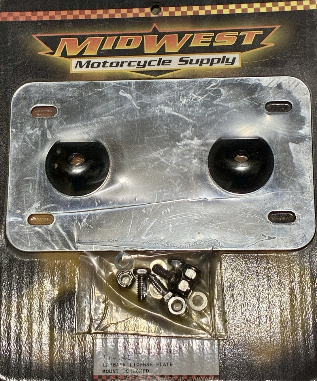 
  
  MIDWEST MOTORCYCLE SUPPLY LAYBACK LICENSE PLATE MOUNTED, CHROMED
  
