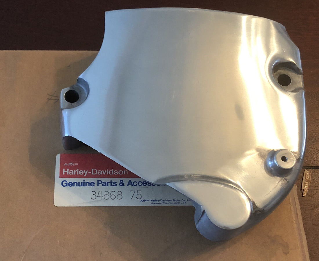
  
  34868-75   HARLEY-1971-1976 XLH   POLISHED ELECTRIC STARTER  SPROCKET COVER   
  
