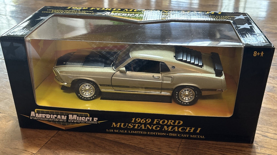 
  
  32511 ERTL AMERICAN MUSCLE CHAMPAGNE GOLD 1969 FORD MUSTANG MACH 1 1:18 DIE CAST
  
